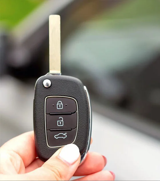 Speedy Keys auto locksmith completing a car key job on-site in Colchester, Essex