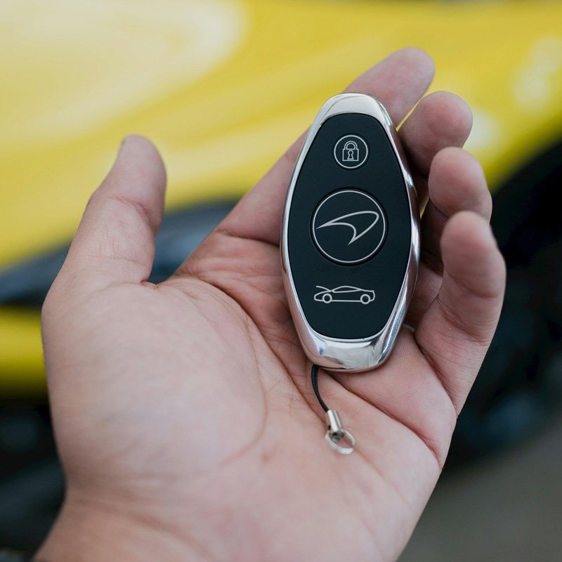 Speedy Keys auto locksmith repairing a car key on-site in Essex