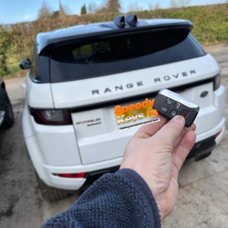 Speedy Keys auto locksmith programming a replacement Land Rover key on-site in Essex